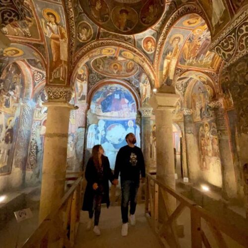 goreme-open-air-museum-toursits-in-a-church-looking-up-Urgup Tourism Travel Agency